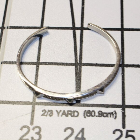 Silver-Tone Cuff Bracelet with Crystal Accents & Pyramid Stud Design - Picture 5 of 5